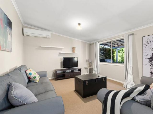 Fully Furnished Easy Care Living in a Charming Brick Home