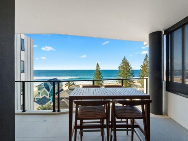 Fully Furnished Elevated three bedroom sanctuary framing sweeping ocean views, with parking