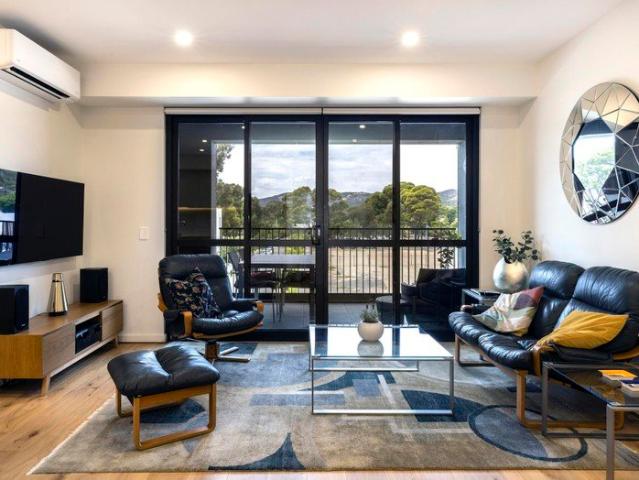 FULLY FURNISHED Executive Apartment, Ideally Located