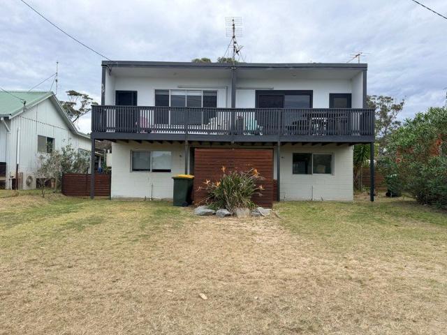 Fully furnished family home overlooking the water