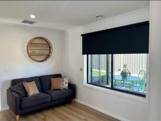Fully Furnished Family Home with Multiple Living Areas & Side Access