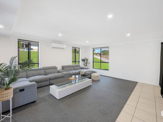 Fully Furnished Family Home with Pool, Home Gym & Waterway Views