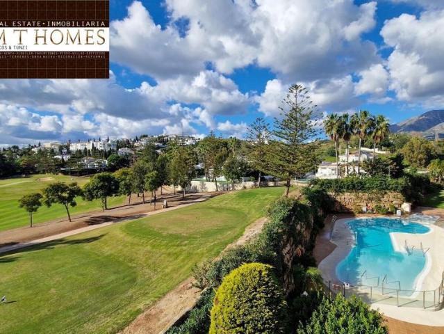 FULLY FURNISHED FRONTLINE GOLF APARTMENT WITH LARGE TERRACE BEAUTIFUL VIEWS POOL AND A GARAGE