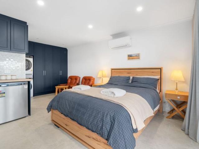 Fully Furnished Hillside Granny Flat with Stunning Bushland Views