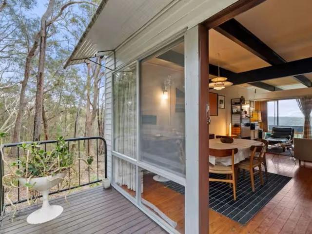 Fully Furnished Iconic Beachcomber Home with Spectacular Blue Mountains Views!