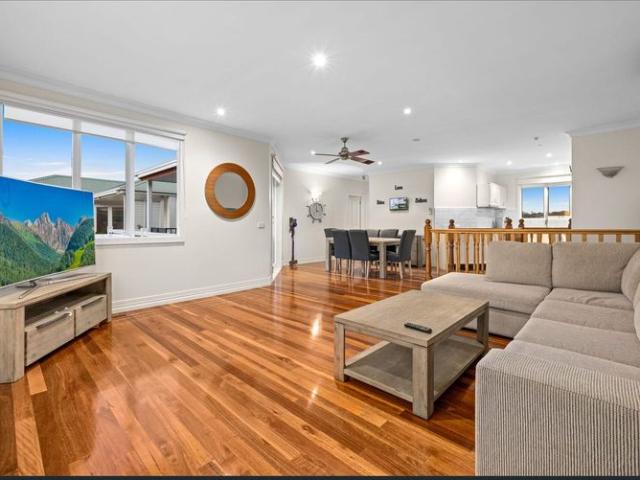 Fully Furnished Luxury Coastal Townhouse Moments from Fisherman’s Beach