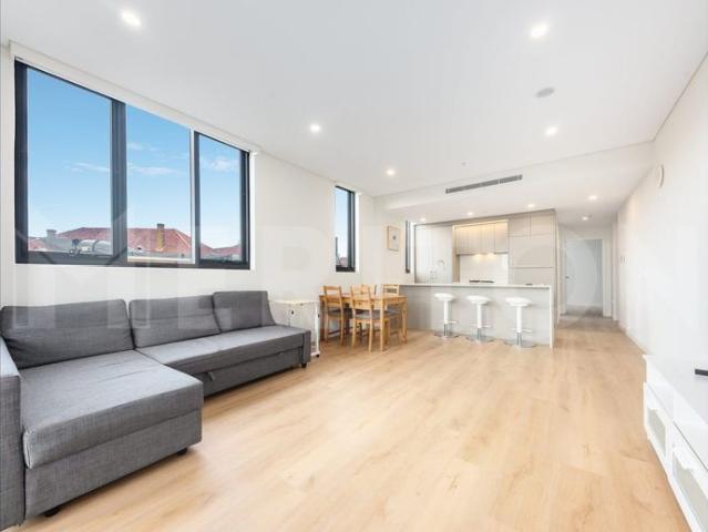 Fully Furnished Modern Apartment in a Sought After Architectural Building