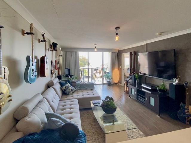 Fully furnished modern style unit with ocean views and rooftop entertaining
