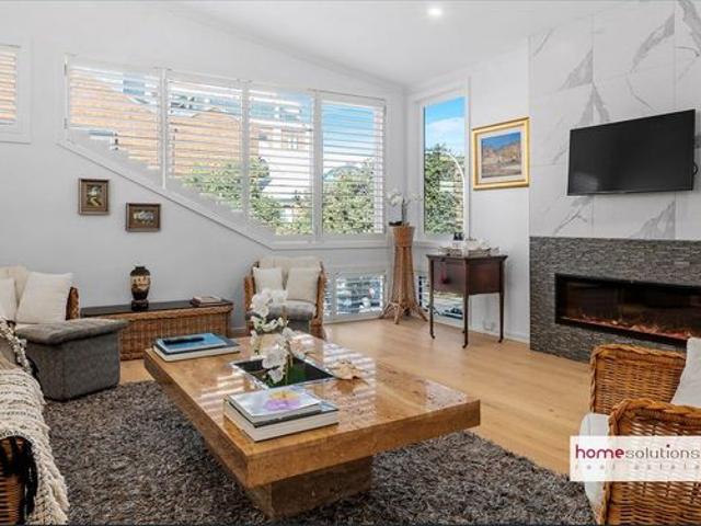 FULLY FURNISHED newly renovated townhouse, meters from the beach. By Private Inspection or Virtual Tour