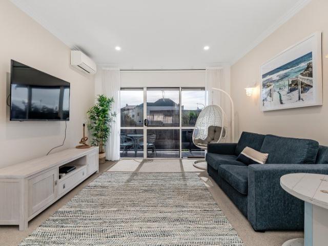 Fully furnished sparkling white delight with views to the sea