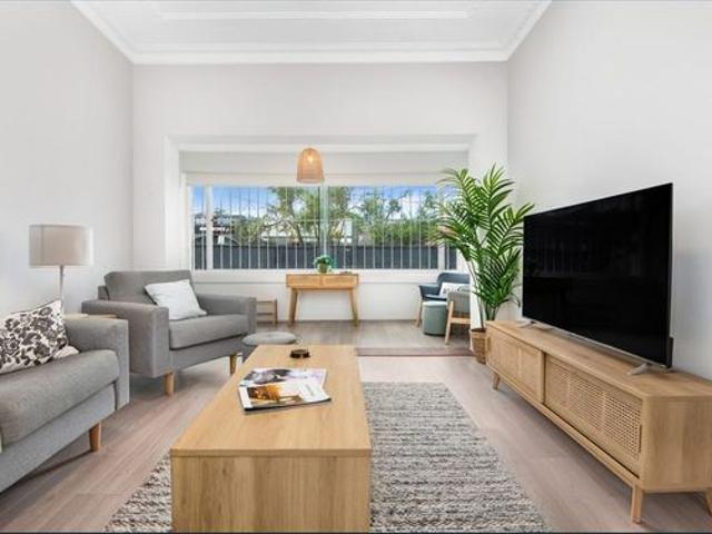 Fully Furnished Stylish Renovated Home with Expansive Level Backyard