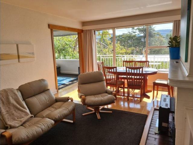 Fully furnished sunny apartment with water and mountain views in Sandy Bay