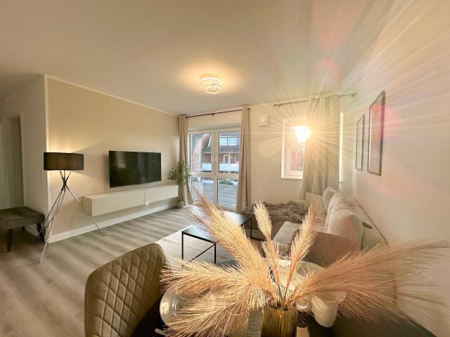 Fully furnished penthouse with parking space in prime location, close to regional train station