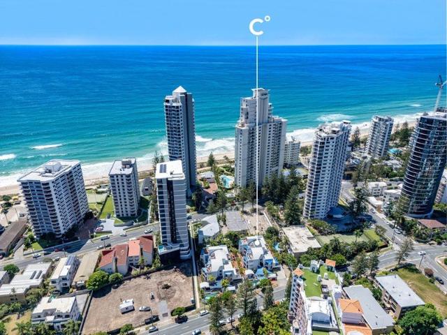 Fully Furnished Renovated North Facing Apartment with Entertainer's Terrace Surfers Beach Resort building 2