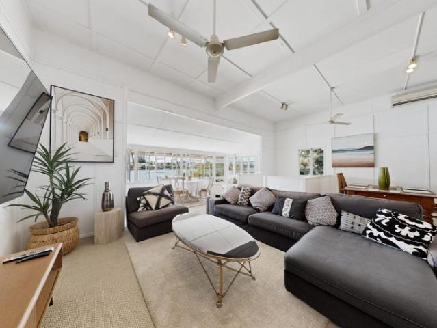 FULLY FURNISHED RIVERFRONT LIVING WITH CITY VIEWS, MULTIPLE LIVING OPTIONS & EXCEPTIONAL LIFESTYLE