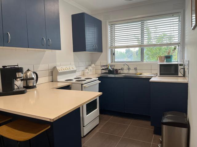 Fully Furnished Top Floor Sunny Two Bedroom Apartment