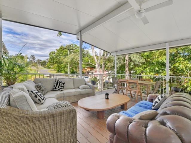 FULLY FURNISHED! Three bedroom home offering comfortable living, lush outdoor space, and move in ready convenience