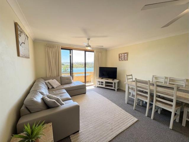 Fully Furnished Unit with Water Views from Every Window