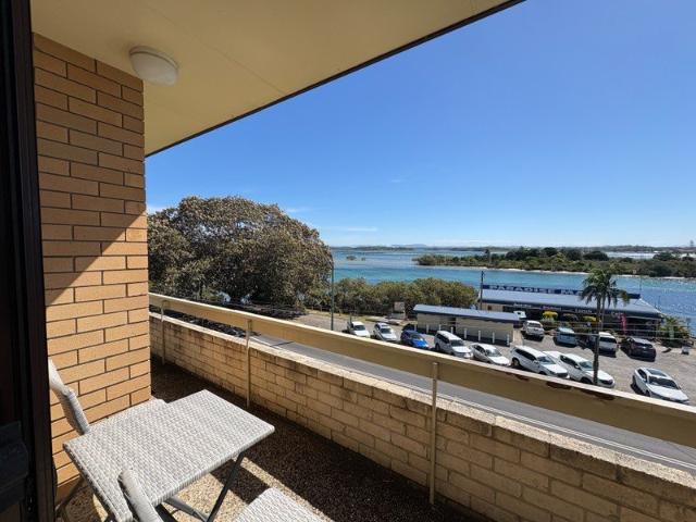 Fully Furnished Unit with Water Views from Every Window