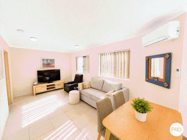 FULLY FURNISHED UNIT Positioned just steps from the Broadwater