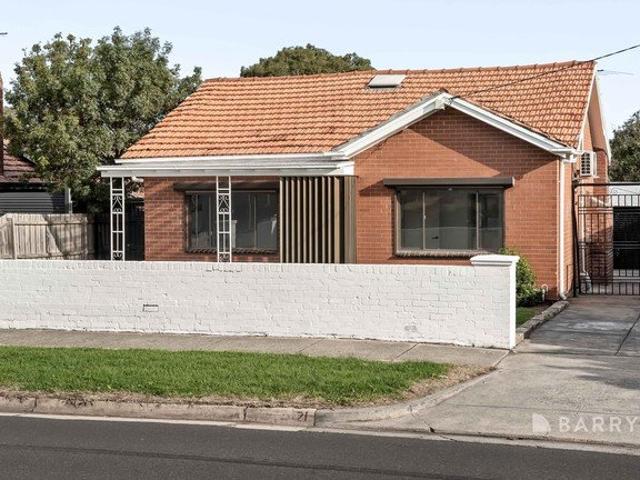 Fully Renovated 3 Bedroom Brick Home with Contemporary Flair