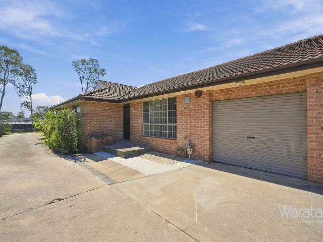 Fully Renovated 2 Bedroom Secure Unit with Lock Up Garage!