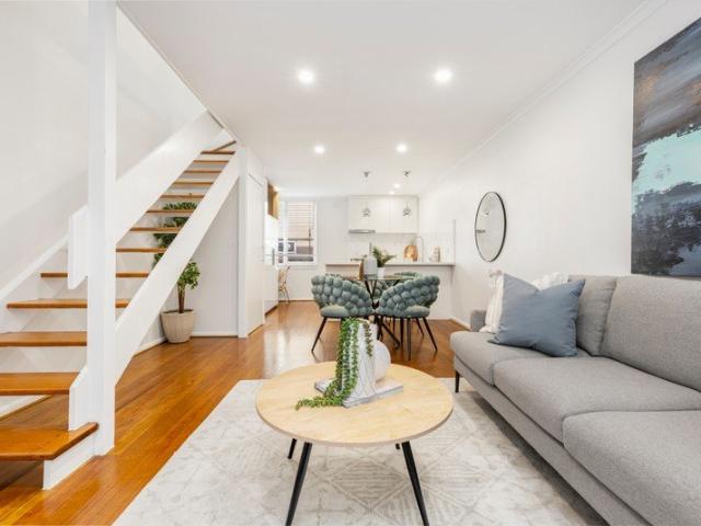 Fully Renovated, Double Story Brick Apartment
