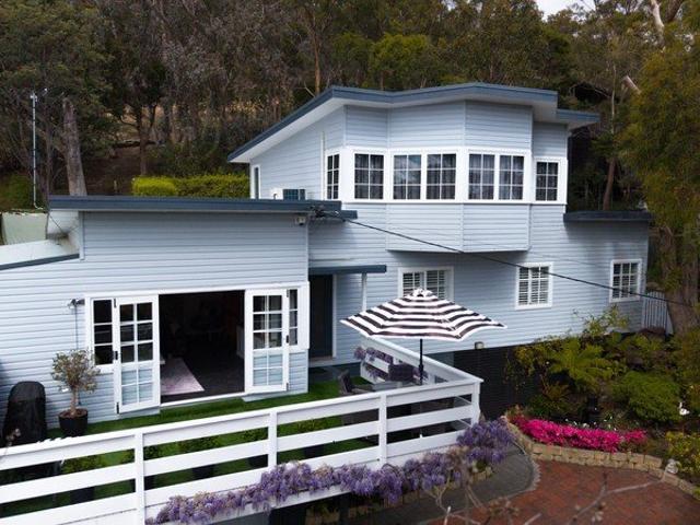 Fully renovated family home with a private parents' retreat and sweeping valley views