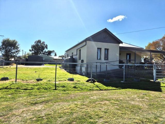 FULLY RENOVATED HOME WITH A PEACEFUL VILLAGE LIFESTYLE