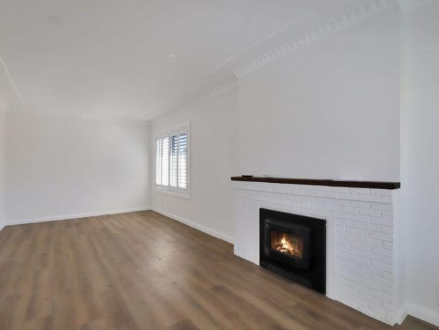 Fully Renovated Home with Side Access & Workshop