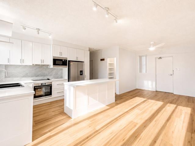 Fully Renovated, Light Drenched, Top Floor Apartment!