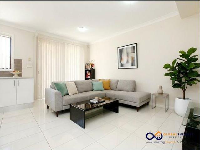 FULLY RENOVATED | Modern & Ultra Convenient Townhouse!