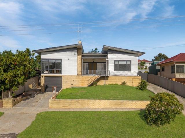 Fully renovated Mid century with elevated views and flexible living options for a large family