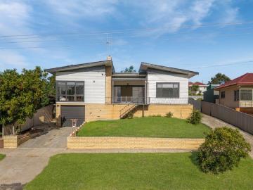 Fully renovated Mid century with elevated views and flexible living options for a large family
