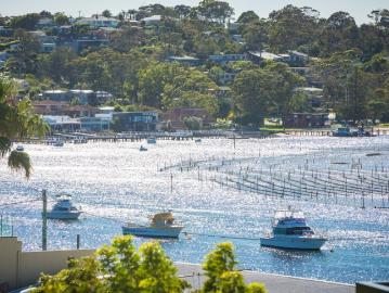 Fully Renovated, Single Level Unit with Water Views