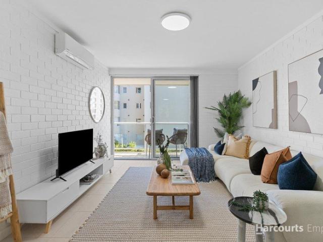 Fully Renovated Riverside Living with Stunning City Views