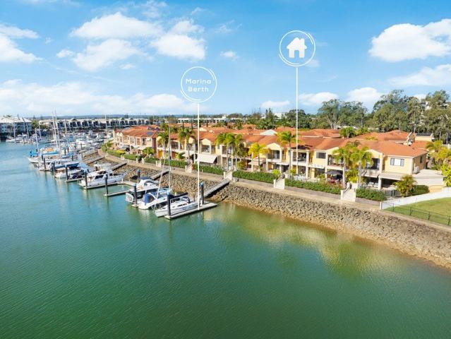 FULLY RENOVATED WATERFRONT LIVING WITH PRIVATE PONTOON TO ACCOMMODATE A 45ft VESSEL