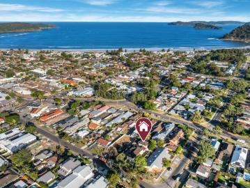 Fully Renovated Townhouse in Prime Beachside Location