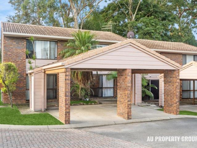 Fully Renovated Townhouse with Peaceful Views in a Secure Gated Complex Perfect First Home or Investment