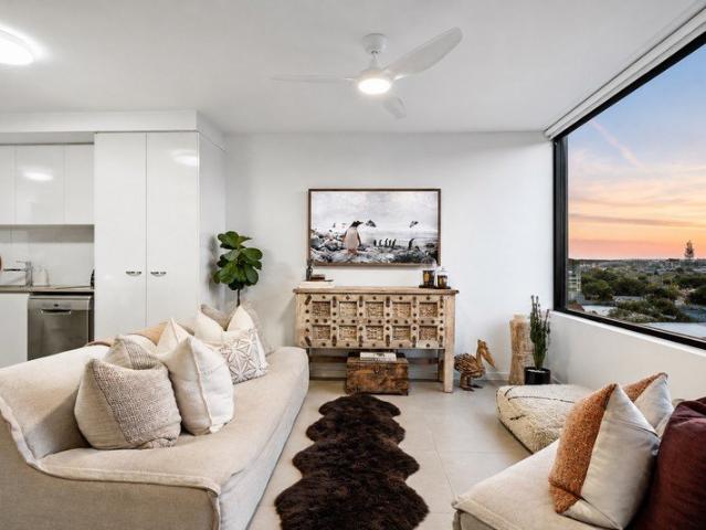 Fully Renovated Top Floor Apartment with Broadwater, Skyline & Hinterland Views