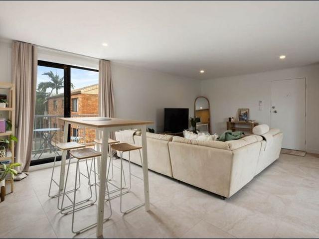 Fully Renovated Top Floor Apartment with Pool in Prime Coastal Location
