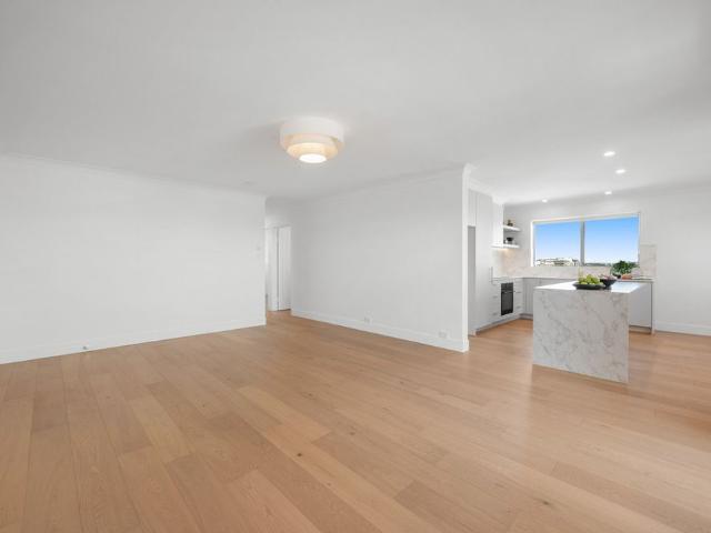 Fully Renovated Top Floor Residence with Elevated Views, Footsteps from Racecourse Road