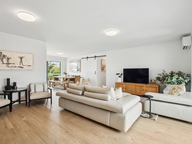 Fully renovated three bedroom apartment in beachfront complex