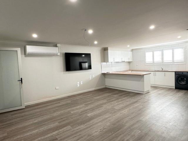 FULLY RENOVATED UNIT WITH APPLIANCES