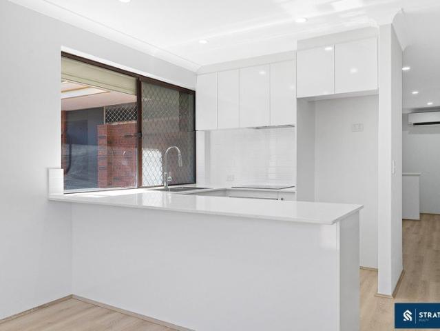 Fully Renovated Unit with Secure Living & Rare Outdoor Space