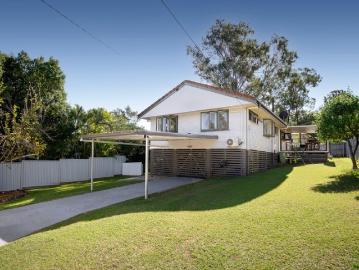 Fully Refreshed Four Bedroom Haven With Deck, Shed, Solar and More Move In Ready!