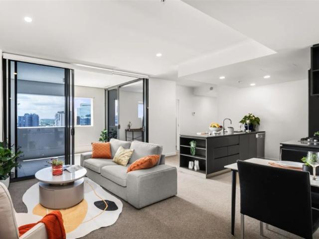 Furnished 2 Bedroom + MPR Apartment with City Views