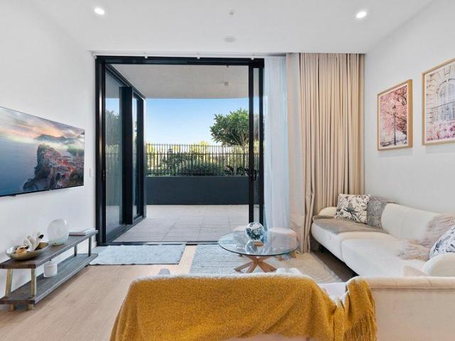 Furnished 2br garden apartment in the salubrious Eve building