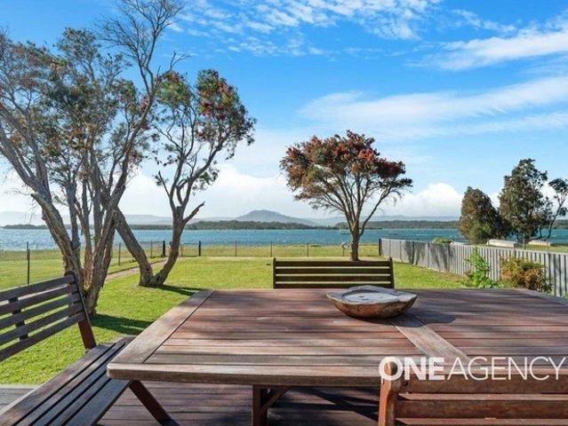 FURNISHED COASTAL RETREAT WITH WATER VIEWS