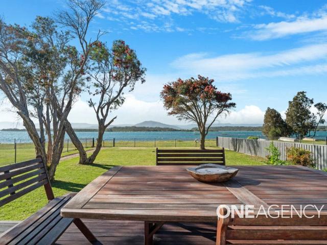 FURNISHED COASTAL RETREAT WITH WATER VIEWS